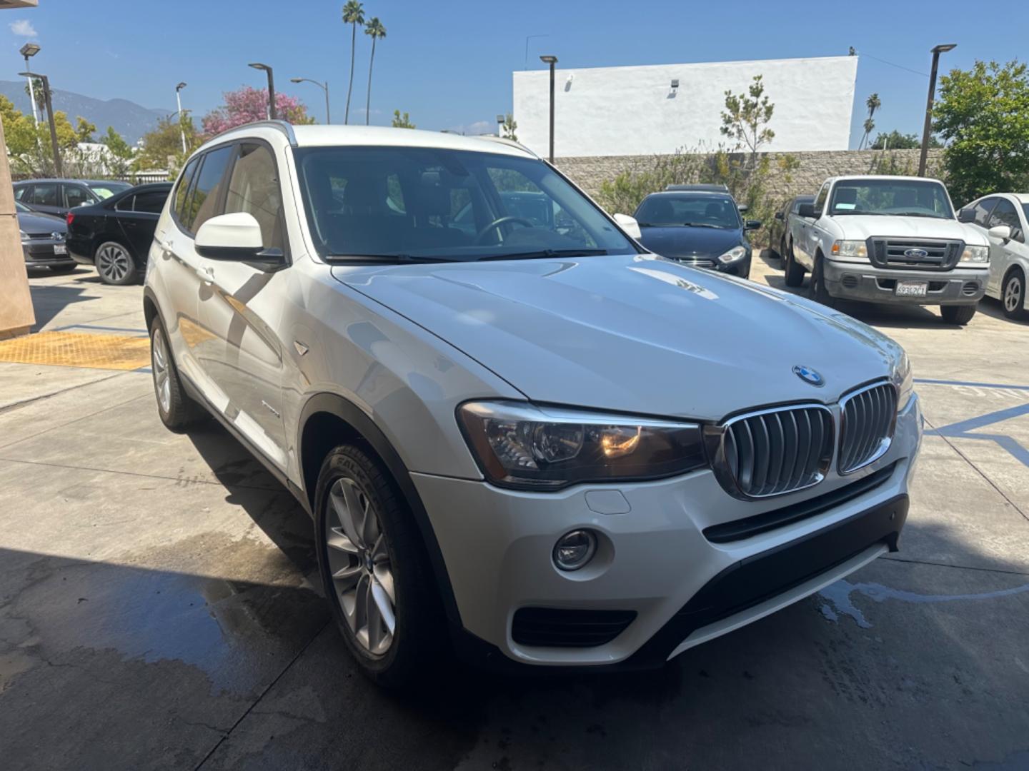 2017 WHITE /BLACK BMW X3 (5UXWX9C37H0) , located at 30 S. Berkeley Avenue, Pasadena, CA, 91107, (626) 248-7567, 34.145447, -118.109398 - Crown City Motors is a used “Buy Here Pay Here” car dealer in Pasadena CA. “Buy Here Pay Here” financing, means that when you purchase your vehicle from our dealership, that you make the payments to the dealership as well. We do not need the banks approval to get you approved for a used auto - Photo#6